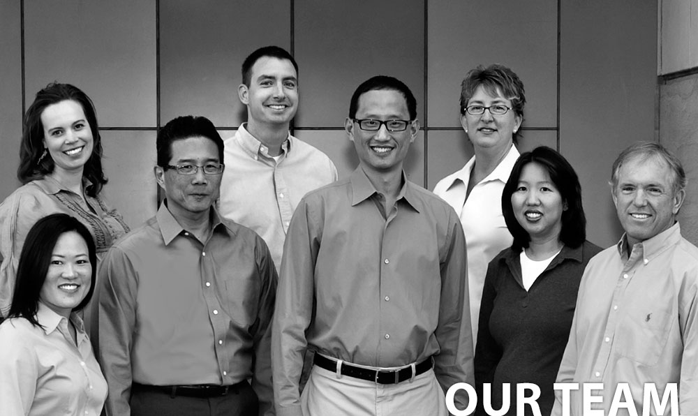 A black and white photo of the CWR Team